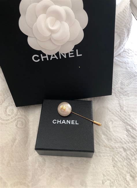 chanel brooch stamp